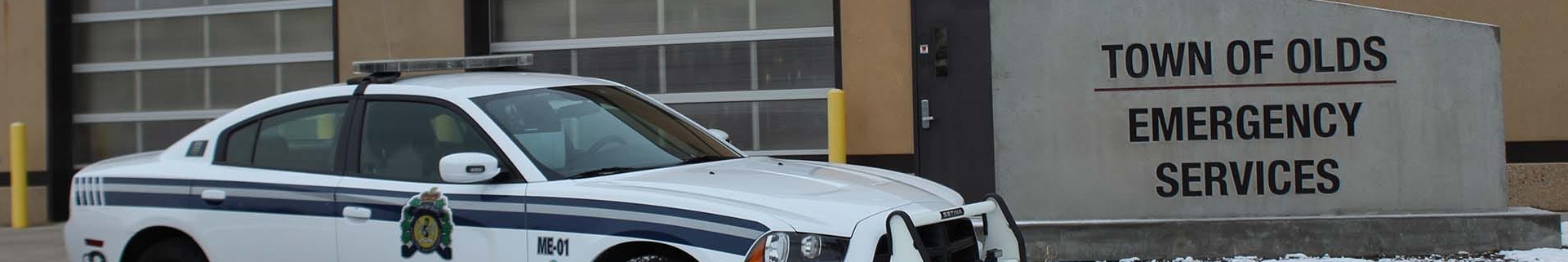Town of Olds RCMP cruiser in front of Emergency Services building